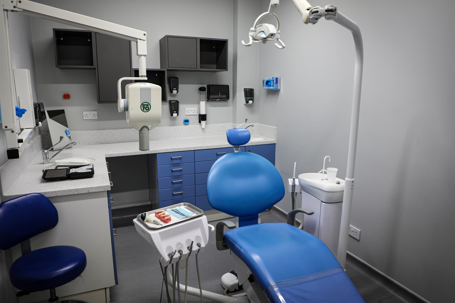 Dental surgery treatment room with chair and x-ray unit